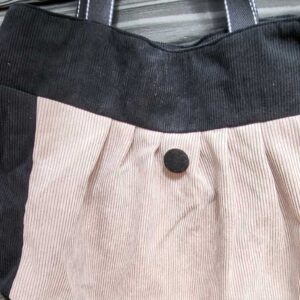 Sac en velours noir et beige