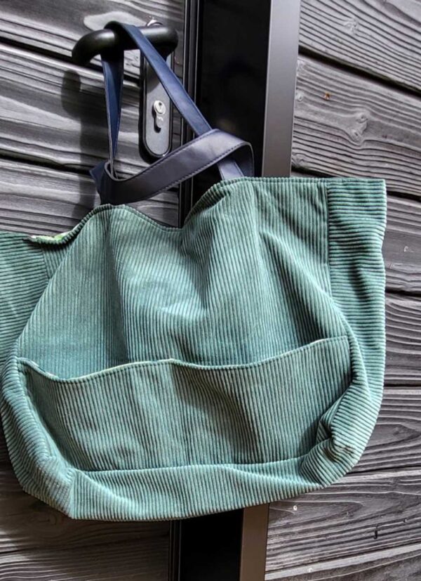 Sac en velours turquoise avec poche extérieur